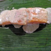 Spicy salmon in banana leaves