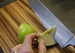 Remove core by slicing in from the bottom of the apple